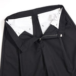 Pantalones anchos plisados