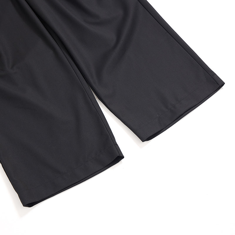 Pantalones anchos plisados
