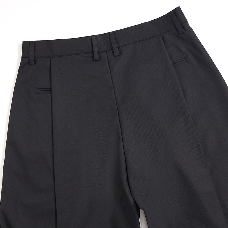 Pantalones anchos plisados
