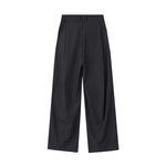 Pantalones anchos plisados