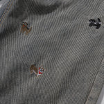 Bermudas vaqueras rasgadas con parches de camuflaje