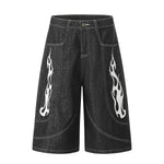 Bermudas vaqueras rasgadas con parches de camuflaje