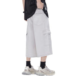 Pantalones cargo anchos y tobilleros de color liso