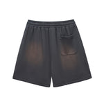 Pantalones cortos lavados con tinte en aerosol de peso pesado