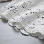 Pearl-Embellished Asymmetric Cut-Out Shorts