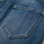 Vaqueros recortados con bordado floral y pedrería