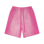 Pantalones cortos desgastados y descoloridos