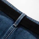 Vaqueros recortados con bordado floral y pedrería