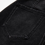 Vaqueros de cintura alta con aberturas y cuentas de perlas