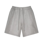 Pantalones cortos desgastados y descoloridos