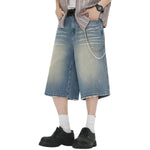 Vaqueros desgastados de pierna ancha y corte cropped