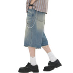 Vaqueros desgastados de pierna ancha y corte cropped