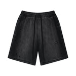 Pantalones cortos desgastados y descoloridos