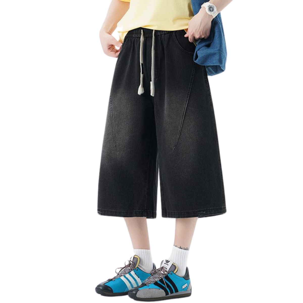 Pantalones vaqueros desgastados de pierna ancha y corte cropped