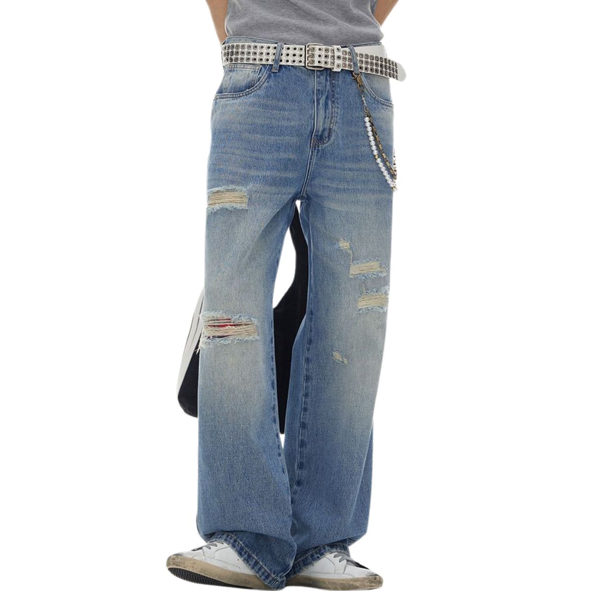 Vaqueros rectos rotos con dobladillo desgastado