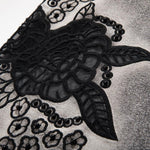 Falda vaquera con bordado de perlas y lavado vintage