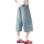 Pantalones vaqueros lavados de pierna ancha y corte cropped