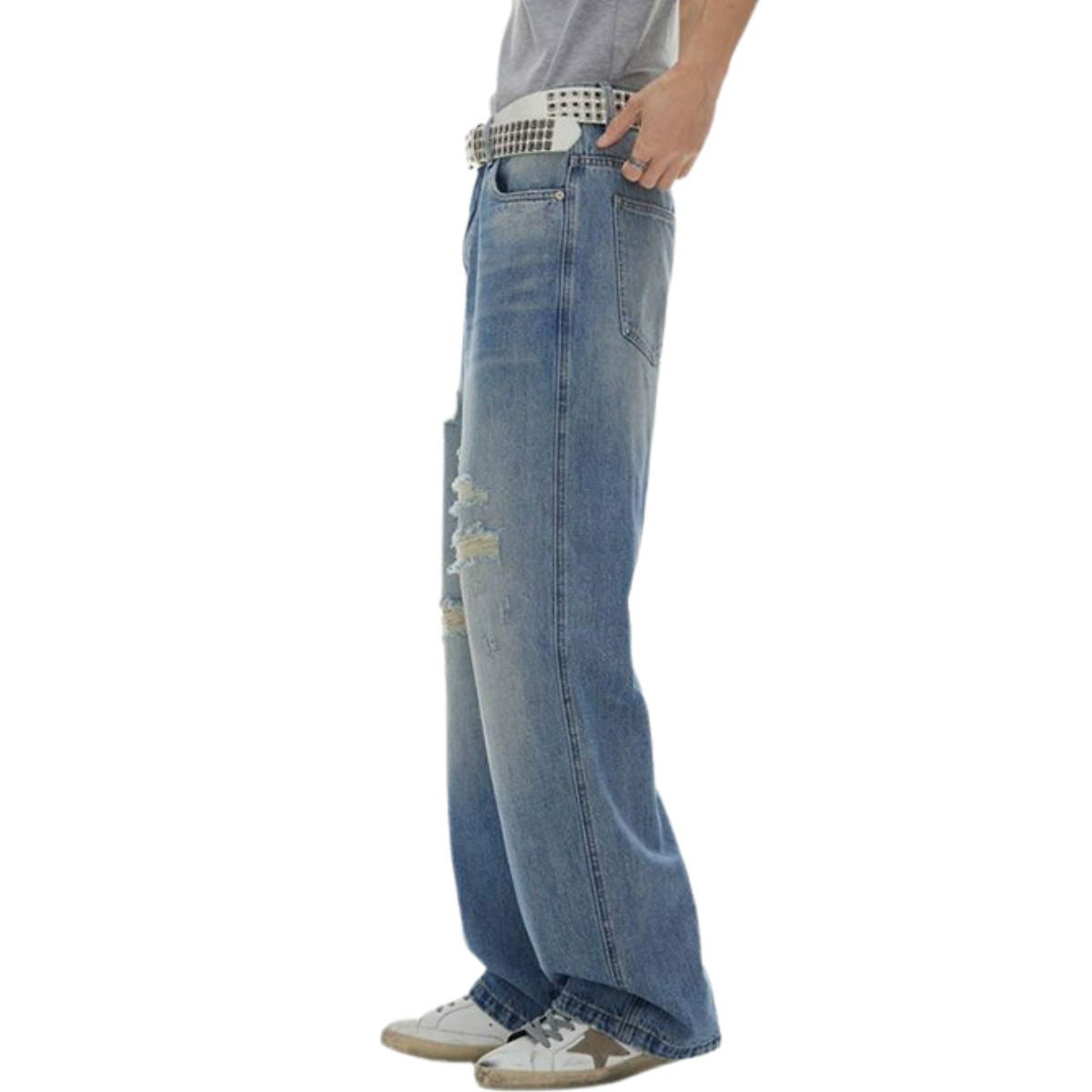 Vaqueros rectos rotos con dobladillo desgastado