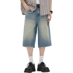 Vaqueros desgastados de pierna ancha y corte cropped