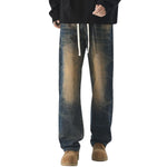 Vaqueros vintage lavados con cintura con cordón