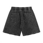 Pantalones cortos desgastados con lavado a la piedra