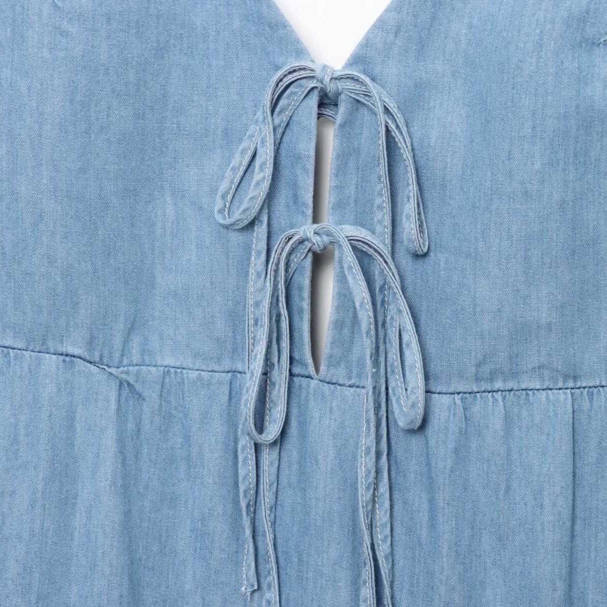 Falda vaquera con bordado de perlas y lavado vintage