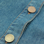 Vestido midi vaquero con corsé bordado con lazo