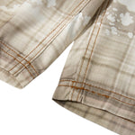 Bermudas vaqueras rasgadas con parches de camuflaje