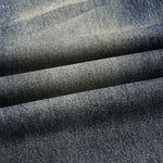 Loose Straight‑Leg Vintage Whiskered Jeans