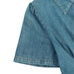 Vestido midi vaquero con corsé bordado con lazo