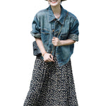 Vestido midi vaquero sin mangas con botones y aberturas en la parte delantera