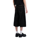 Bermudas con lavado vintage y salpicaduras de tinta