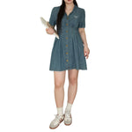 Minivestido vaquero con corsé bordado con lazo