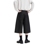 Bermudas con lavado vintage y salpicaduras de tinta