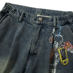 Pantalones vaqueros holgados con estampado de serpiente