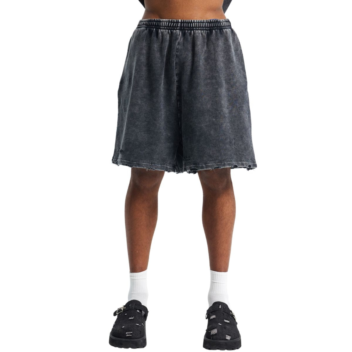 Pantalones cortos desgastados con lavado a la piedra