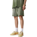 Pantalones cortos desgastados y descoloridos