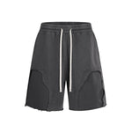 Pantalones cortos deportivos con bordes sin rematar y lavados a la piedra