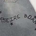 Bermudas vaqueras rasgadas con parches de camuflaje