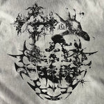 Camiseta gótica pesada con gráficos y bordes sin rematar