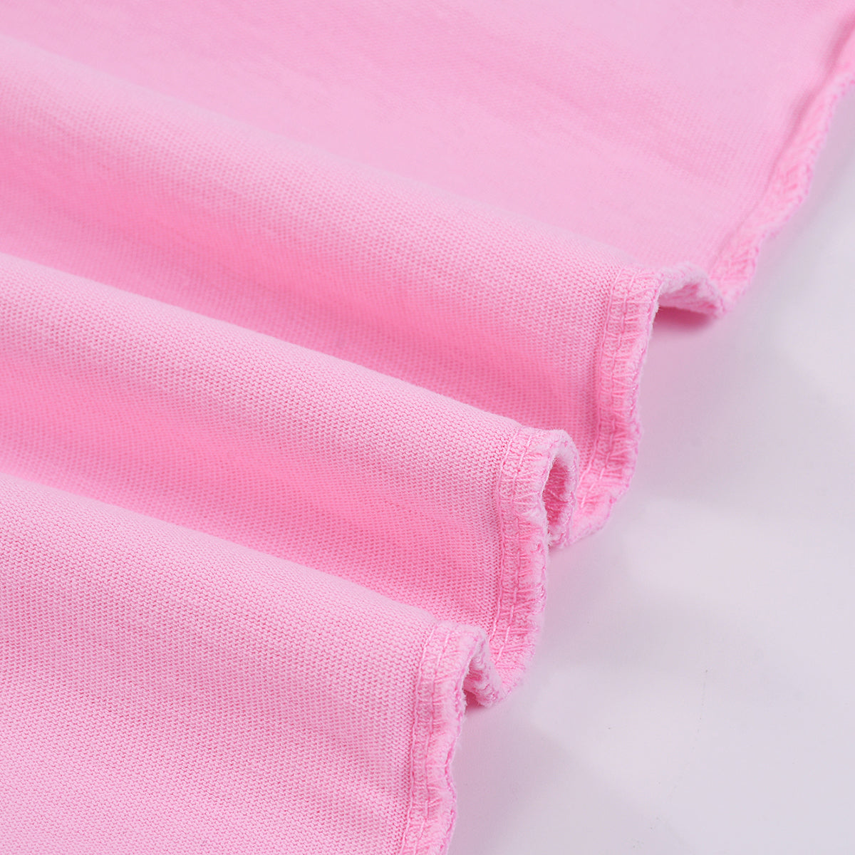 Camiseta rosa lavada a la piedra para mujer de 7.5 oz