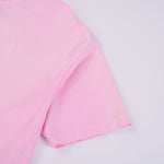 Camiseta rosa lavada a la piedra para mujer de 7.5 oz