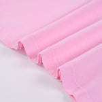 Camiseta rosa lavada a la piedra para mujer de 7.5 oz