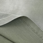 Camiseta holgada lavada y descolorida de peso pesado de 9 oz