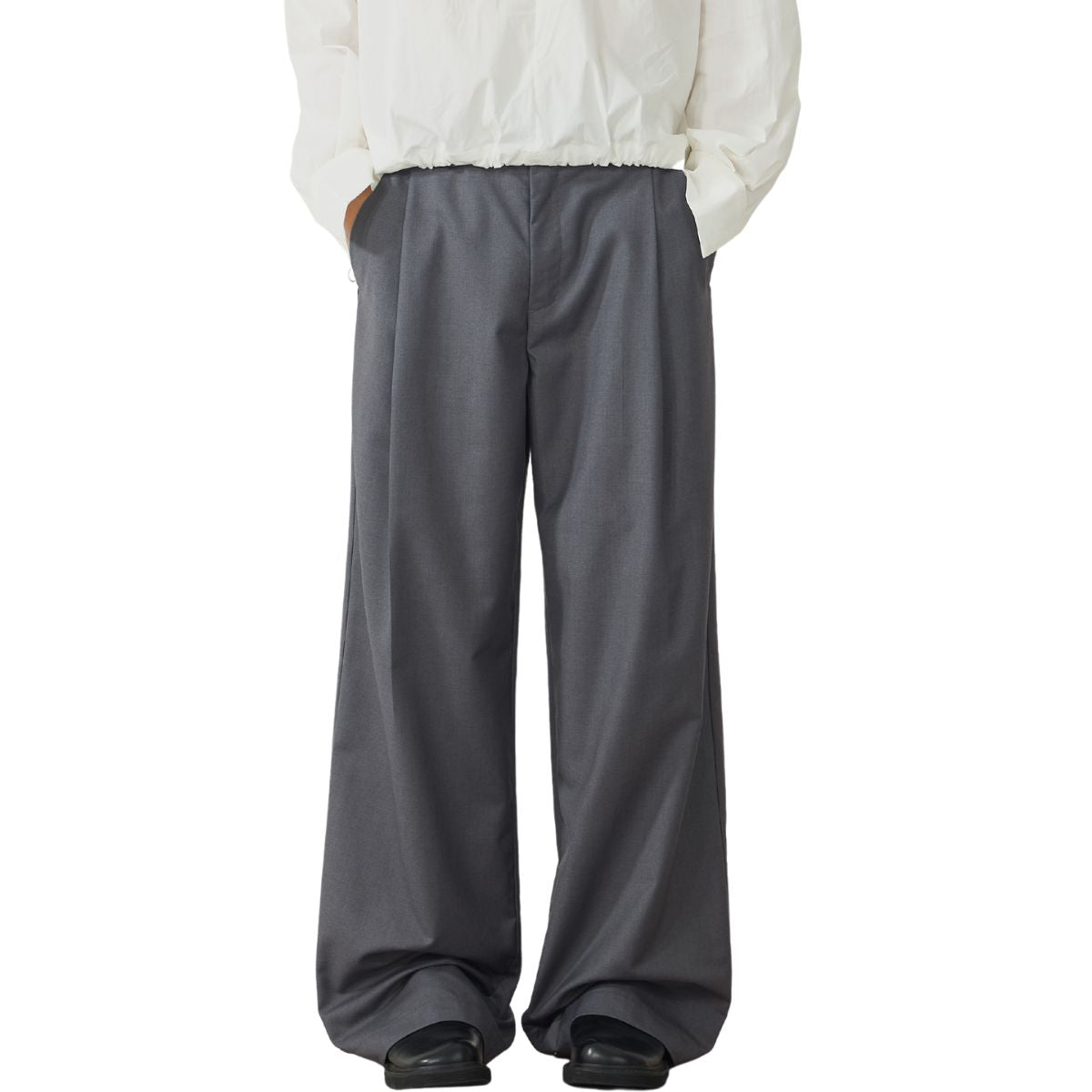 Pantalones anchos plisados