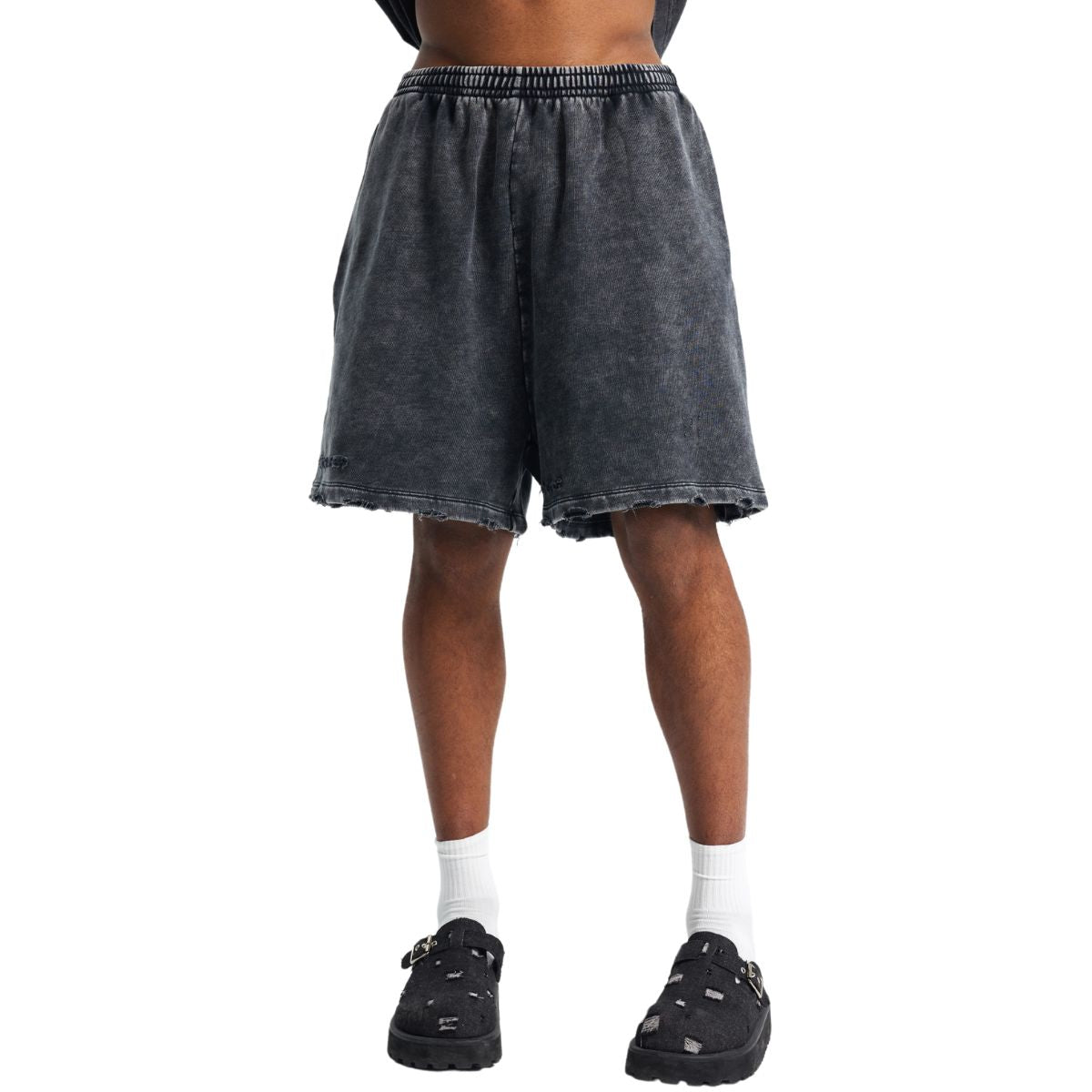 Pantalones cortos desgastados con lavado a la piedra