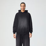 Sudadera con capucha negra descolorida con bolsillo de canguro