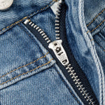 Falda vaquera con bordado de perlas y lavado vintage