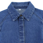 Vestido midi vaquero sin mangas con botones y aberturas en la parte delantera