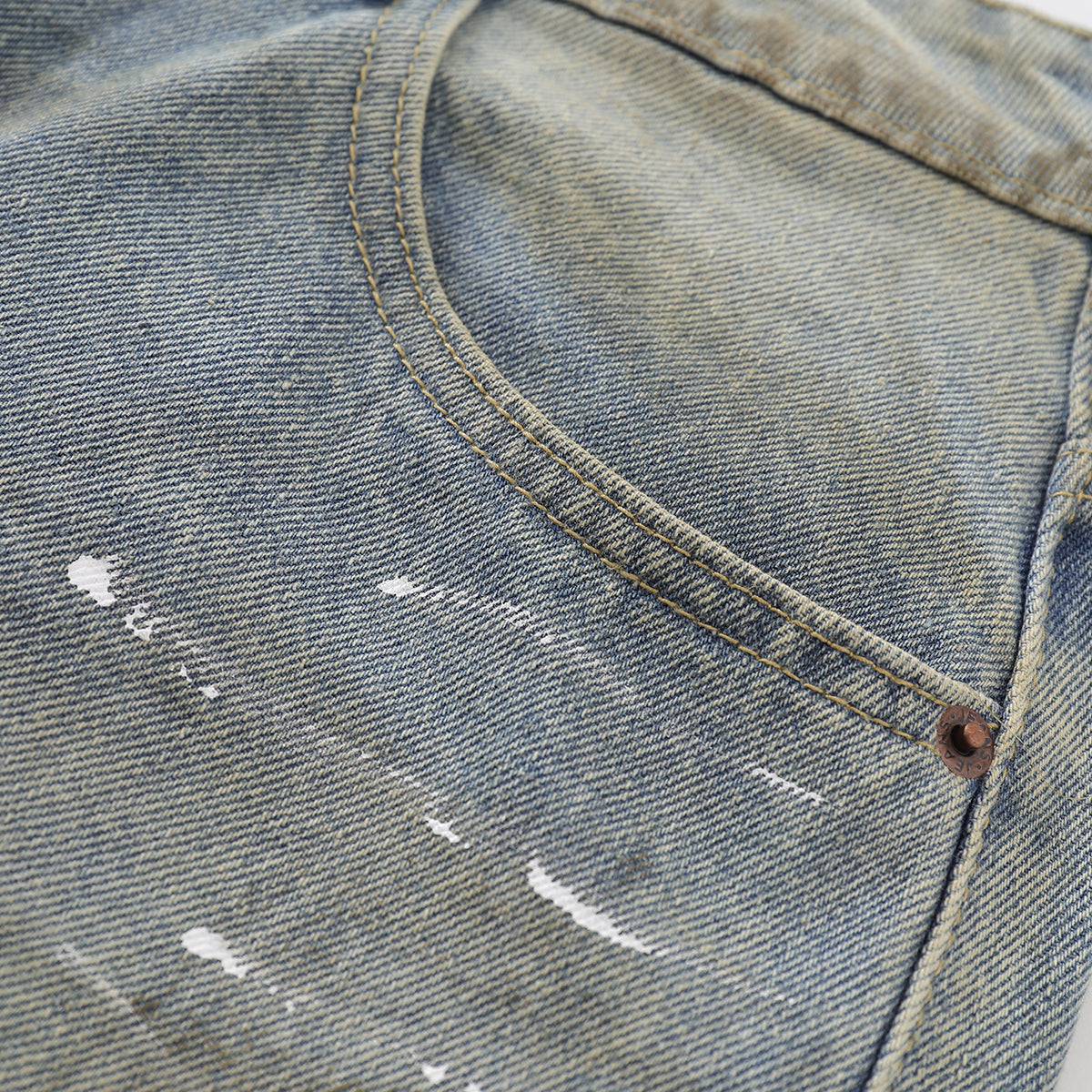 Bermudas con lavado vintage y salpicaduras de tinta